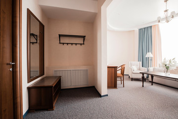 Hotel apartment, hallway room interior in the morning