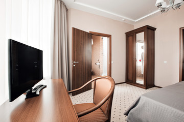 Hotel apartment, bedroom interior in the morning