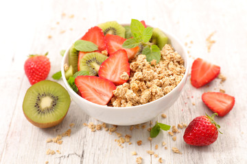 muesli with fruits in bowl