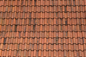 Antique geometric mosaic imbrex and tegula roof tiles pattern macro closeup