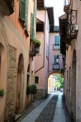Fototapeta na wymiar Old alley in Orta San Giulio at Lake Orta, Piedmont Italy 