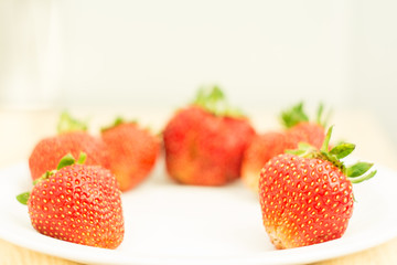 Fresh strawberries were placed on a white background