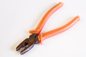 Old pliers on white background. Hand tool household.