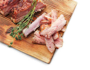 Wooden board with delicious sliced grilled spare ribs on white background