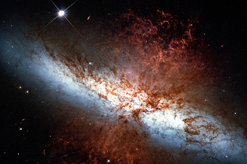 Naklejka premium Messier 82, Cigar Galaxy or M82 in the constellation Ursa Major.