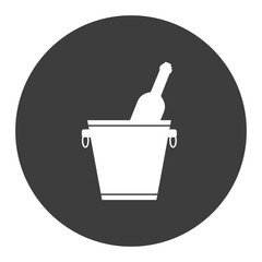 Ice bucket with wine and champagne bottle.