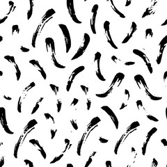 The seamless black and white pattern with brush strokes.