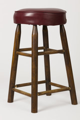 Old Cushioned Bar Stool Have you seen this great old bar stool type chair? Shot on a plain white background. Maybe a seat for a comic or a great place for some fruit? Who knows?