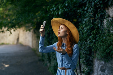 Beautiful young woman walking in summer outdoors in the city, fashion, style