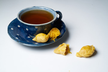Thai dessert Curry Puff with a cup of tea