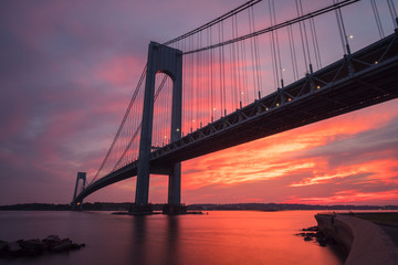 Verrazano-Narrows bridge in Brooklyn and Staten Island, NYC at sunset