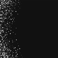 Random falling white dots. Abstract left border with random falling white dots on black background. Vector illustration.