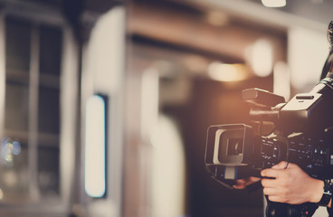 Video camera / videographer close up / cameraman / movie