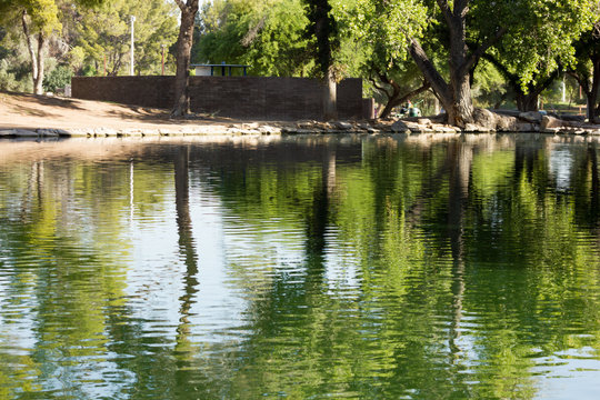 Reflections on the Water with Ducks Reflections on the Water. A fire in the sky. Everything but that last part. Shot while in a more "reflective" mood (really, no pun intended). Ha!