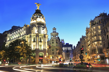 Naklejka premium Gran Vía is an upscale shopping street located in central Madrid. Is known as the Spanish Broadway, and it is one of the streets with the most nightlife in Europe.