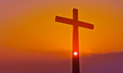 Cross over beautiful sunset background with Copy Space