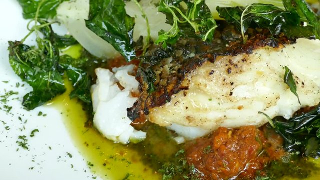 Sea bass steak with sauce
