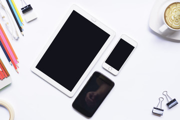 Tablet computer with smartphone and equipment office on isolated.Top view and zoom in