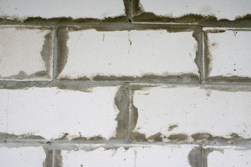 white bricks wall with concrete