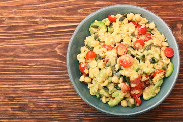 Chickpeas lentils avocado tomato cucumber salad