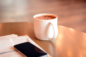 Cup of hot chocolate on the table