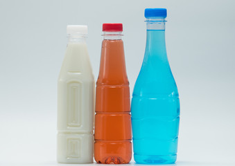 Three modern design bottles of soft drink on white background, just add your own text