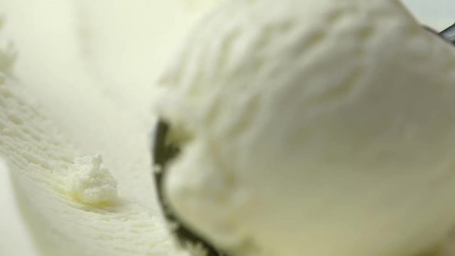 scooping vanilla ice cream close up (4K, HD, high definition 1080p).