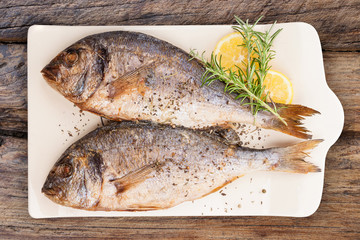 Grilled fish from above. Luxurious seafood eating.