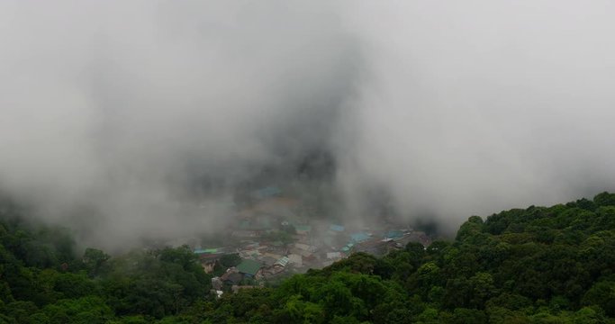 Beautiful foggy morning movement over village on the mountain in Chiang Mai,Thailand.