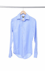 Blue shirt on hanger isolated 