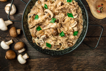 Mushroom beef stroganoff in pan with copy space