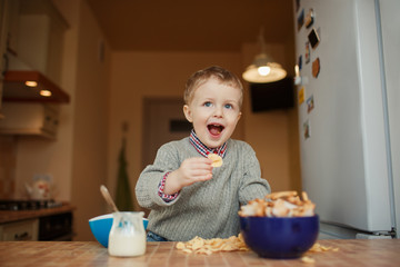 Little boy eating cereal