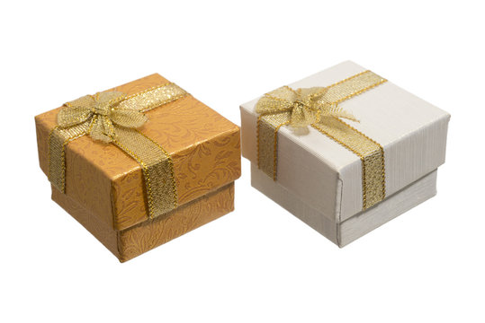 Gift Box And Gold Ribbon Isolated On White Background