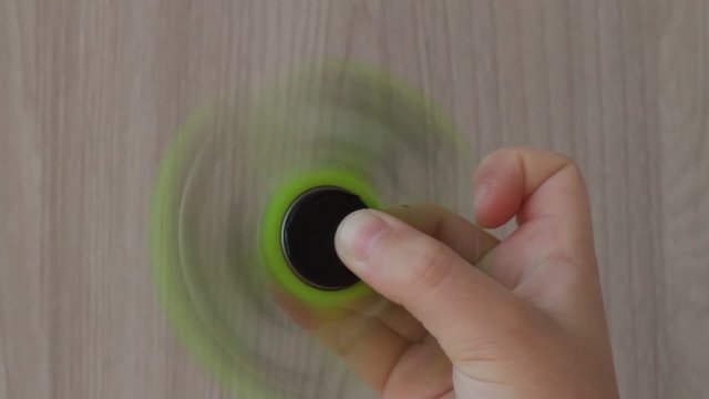 Hand Spinner Or Fidgeting Spinner, Rotating On Child's Hand