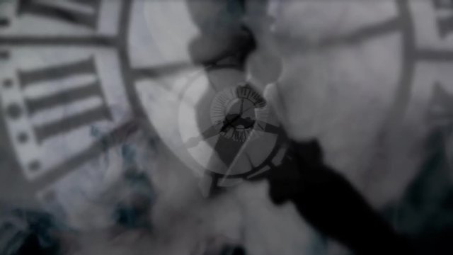 The smokey silhouettes of a clock going forward like crazy.

