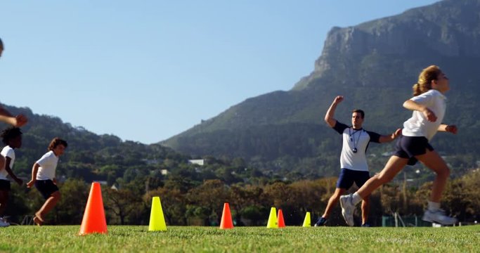 Children running in park during race