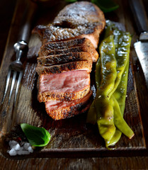 juicy grilled steak and basil 