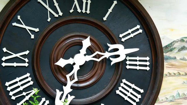 Large clock with Roman numerals