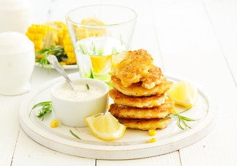 Corn pancakes with cream sauce with tarragon.