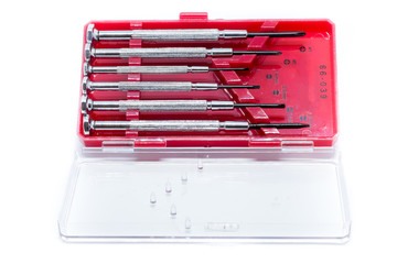 A set of small screwdrivers.