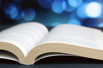 Opened book soft bright light 