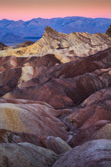 Obraz premium The Colorful Ridges Of Zabriskie Point At Sunrise, Death Valley National Park, California, USA