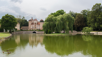 Fototapeta na wymiar Chateau de Sercy in Burgundy, France, beautiful castle with a lake