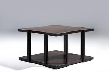 Stylish table with brown wooden top and bottom with black metallic legs