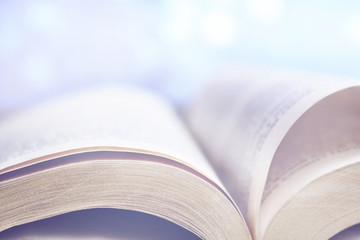 Opened book soft bright light 