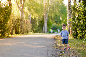 Fototapeta premium Cheerful child in the park