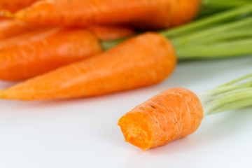 fresh carrots isolated on white background