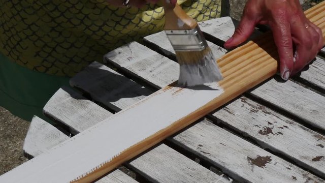 painting a wooden board