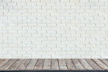 Wooden floors and white brick wall background,Perfect for product placement.