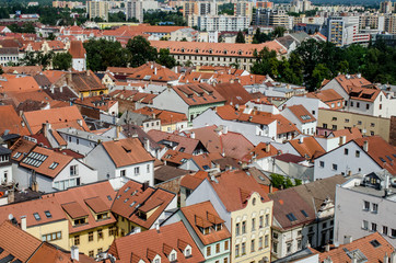 Fototapeta na wymiar Aerial view on medieval roofs in European city